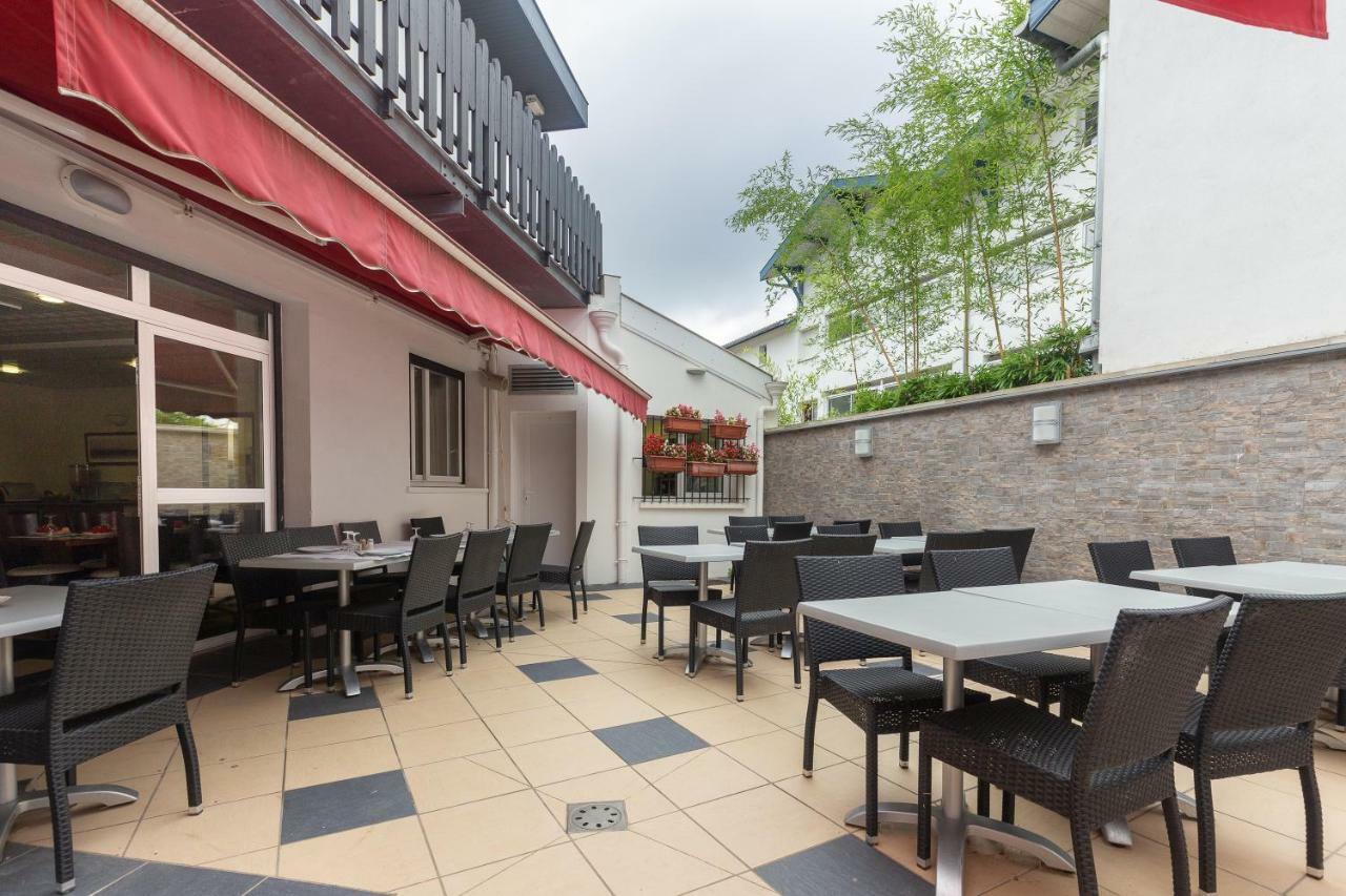 سورت-هوسيغور Logis Hotel Le Rond Point المظهر الخارجي الصورة